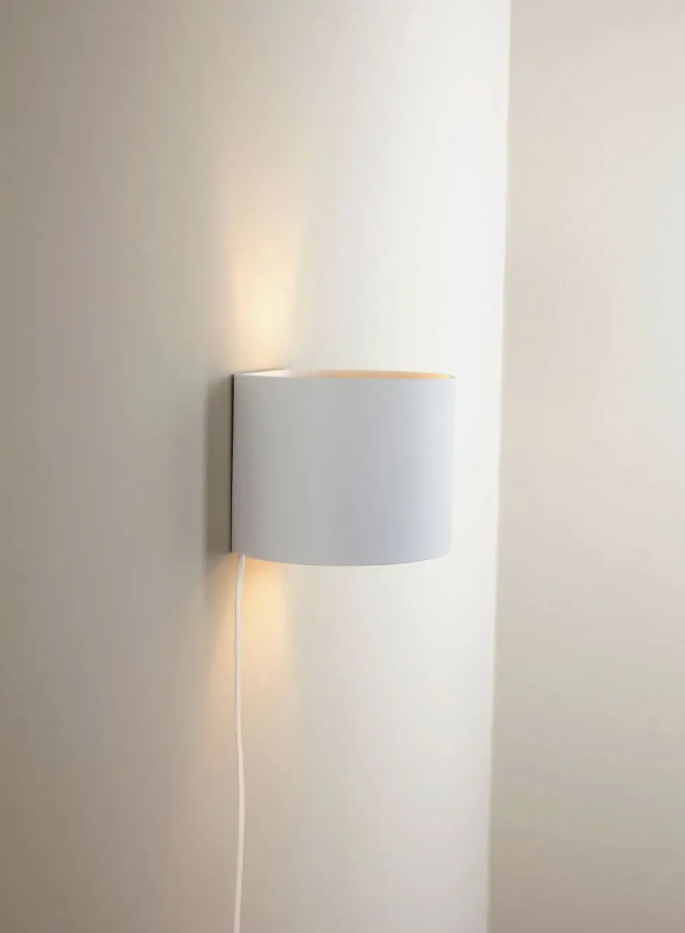 Zanna rund vegglampe - opp/ned med vipp