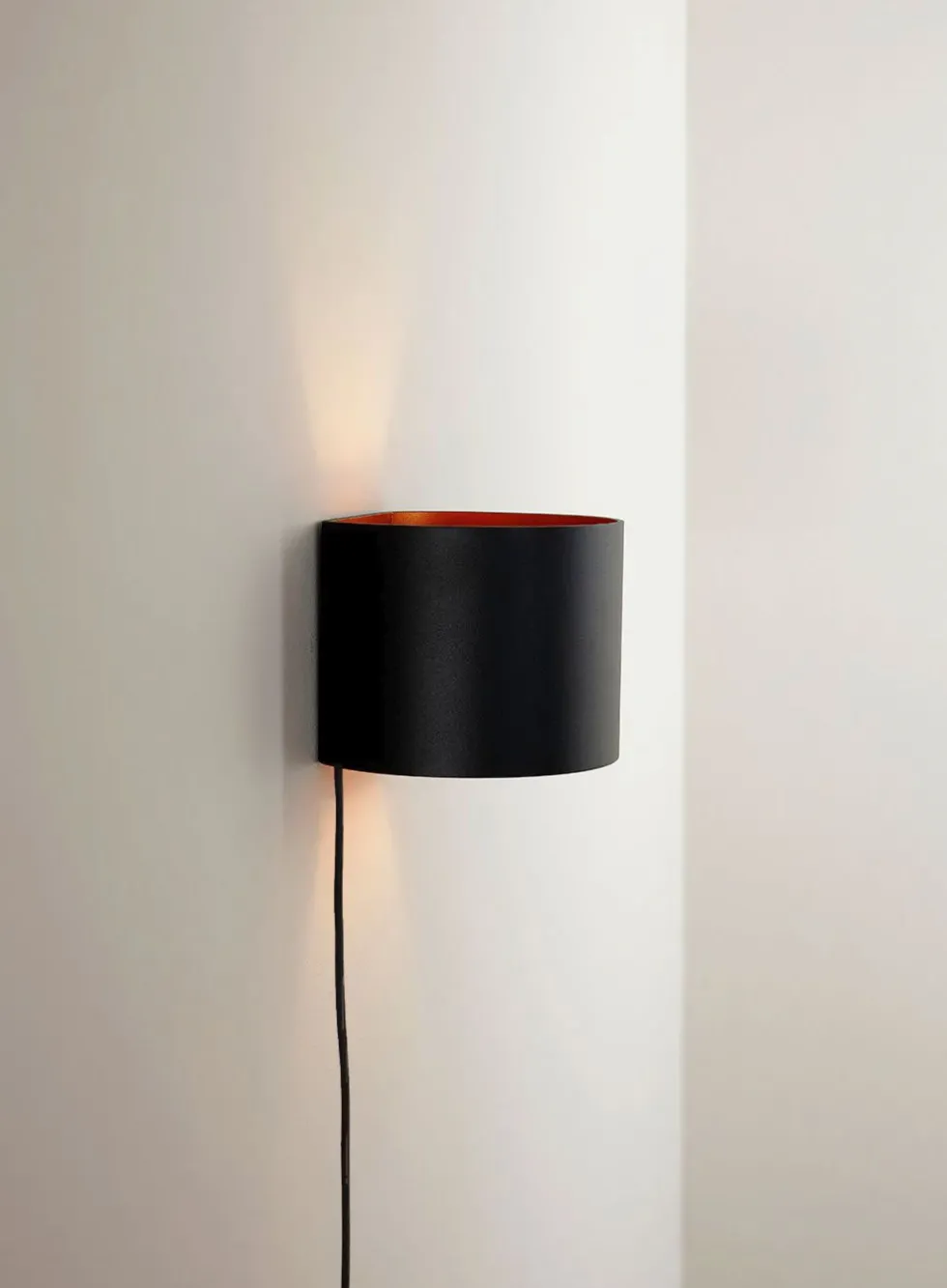 Zanna rund vegglampe - opp/ned med vipp